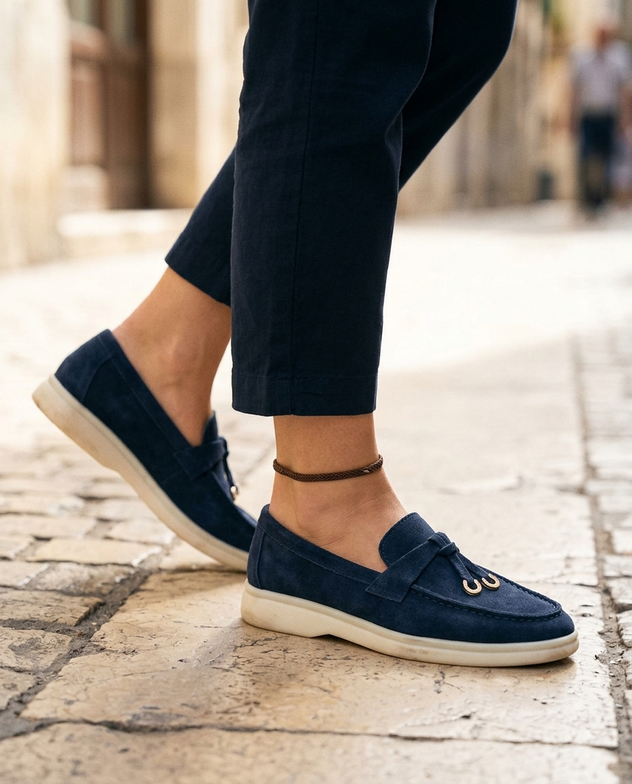 Navy · mid-stride on pavement