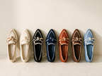 All seven colourways — Bone, Ivory, Black, Navy, Terracotta, Espresso, Cornflower