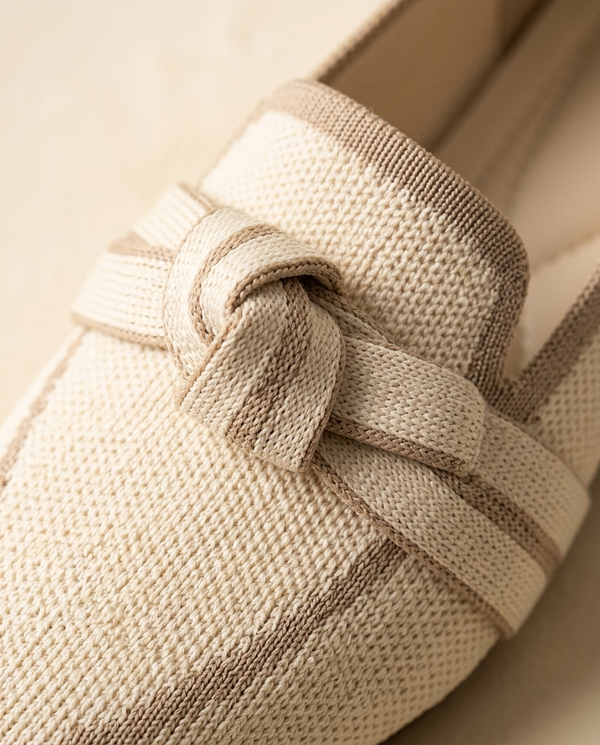 Woven knot detail · contrast piping