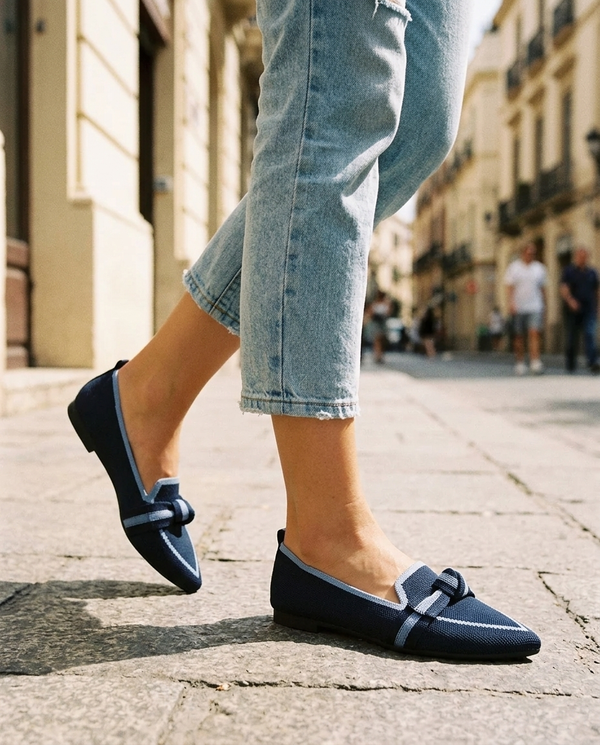 Navy · mid-stride on pavement