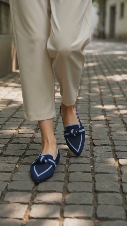 The Long Weekend Loafers in motion — walking in Navy