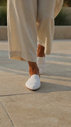 The Barely There Flats in motion — walking in Bone