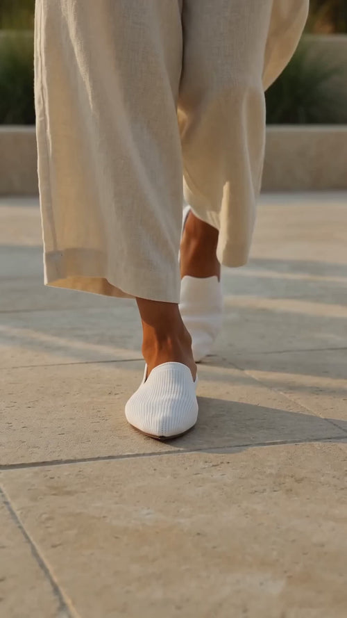 The Barely There Flats in motion — walking in Bone
